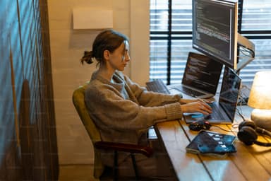 Young woman works on a computer